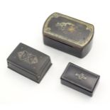 A Victorian papier mache snuff box. Together with a small lacquered patch box with inlaid white