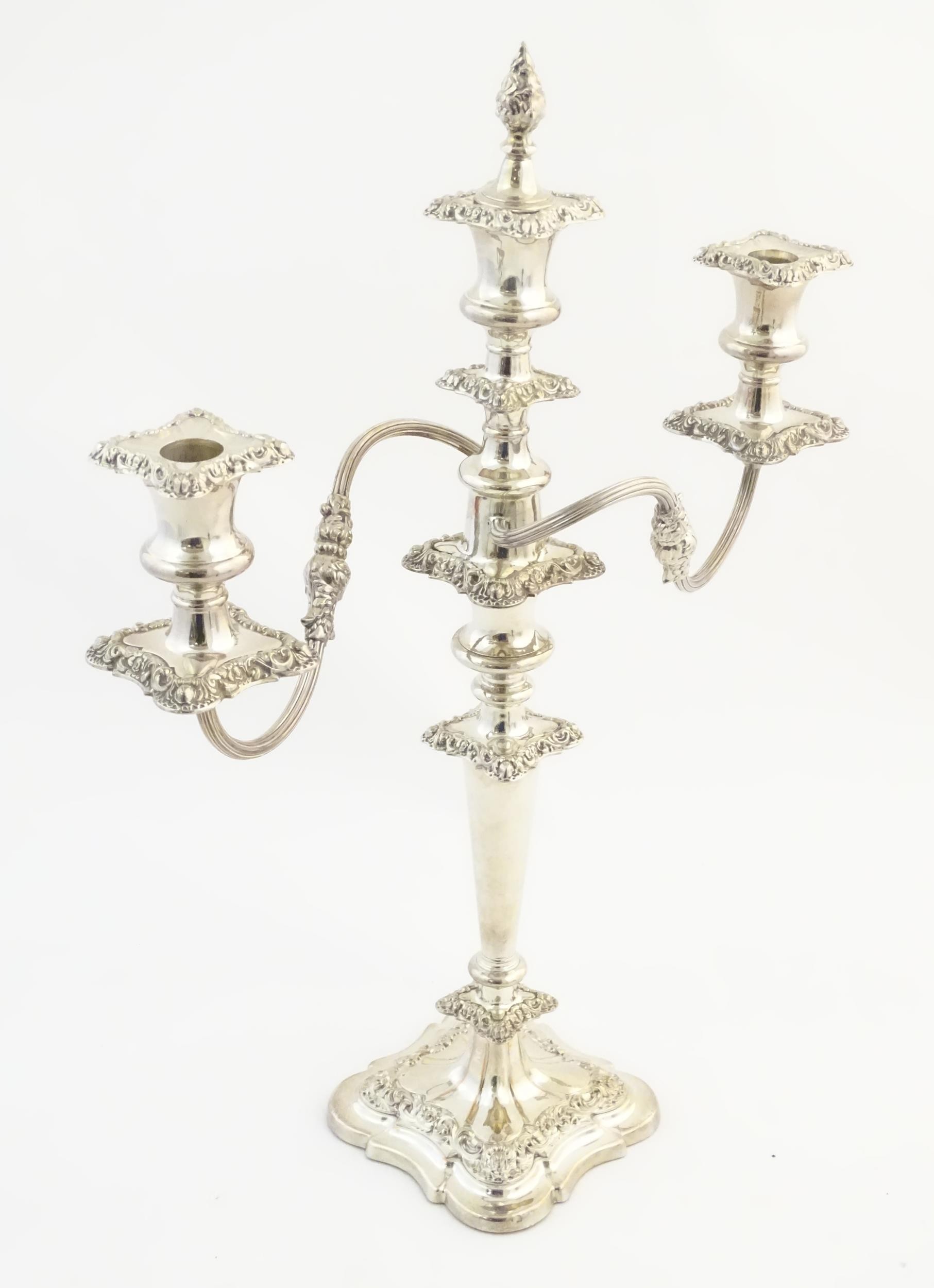 A silver plate table candelabra with two scrolling branches and acanthus scroll detail. Approx 21" - Image 4 of 8