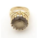A 14ct gold dress ring set with citrine. Ring size approx K 1/2" Please Note - we do not make
