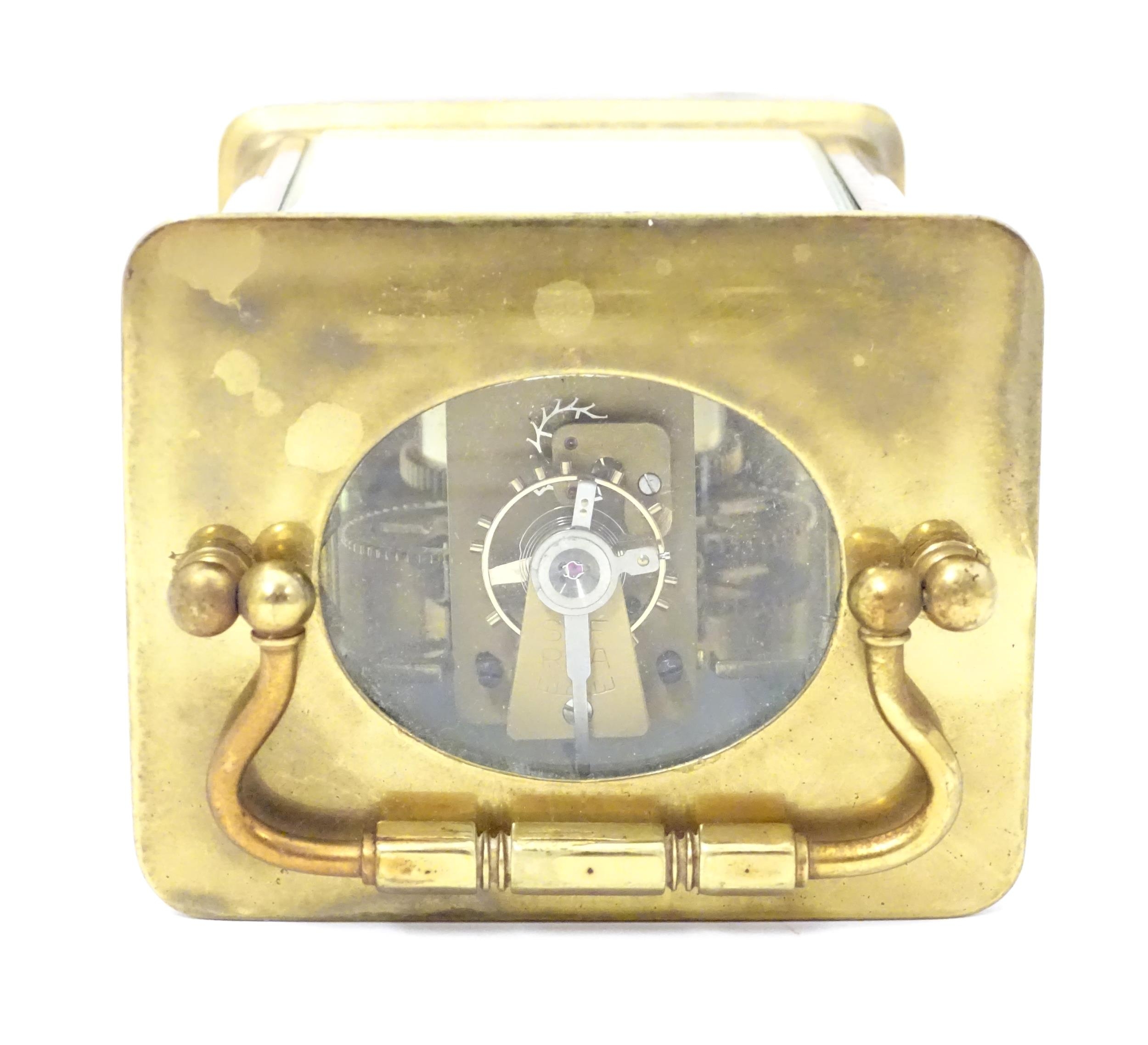 A carriage clock with brass case and enamel dial. Approx. 5 1/2" high overall. Please Note - we do - Image 11 of 13
