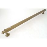 A Victorian brass towel rail, with wall mounts, 33 3/4" long Please Note - we do not make