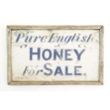 A 20thC hand painted wooden sign 'Pure English Honey For Sale'. Approx. 9" x 14 1/4" Please Note -