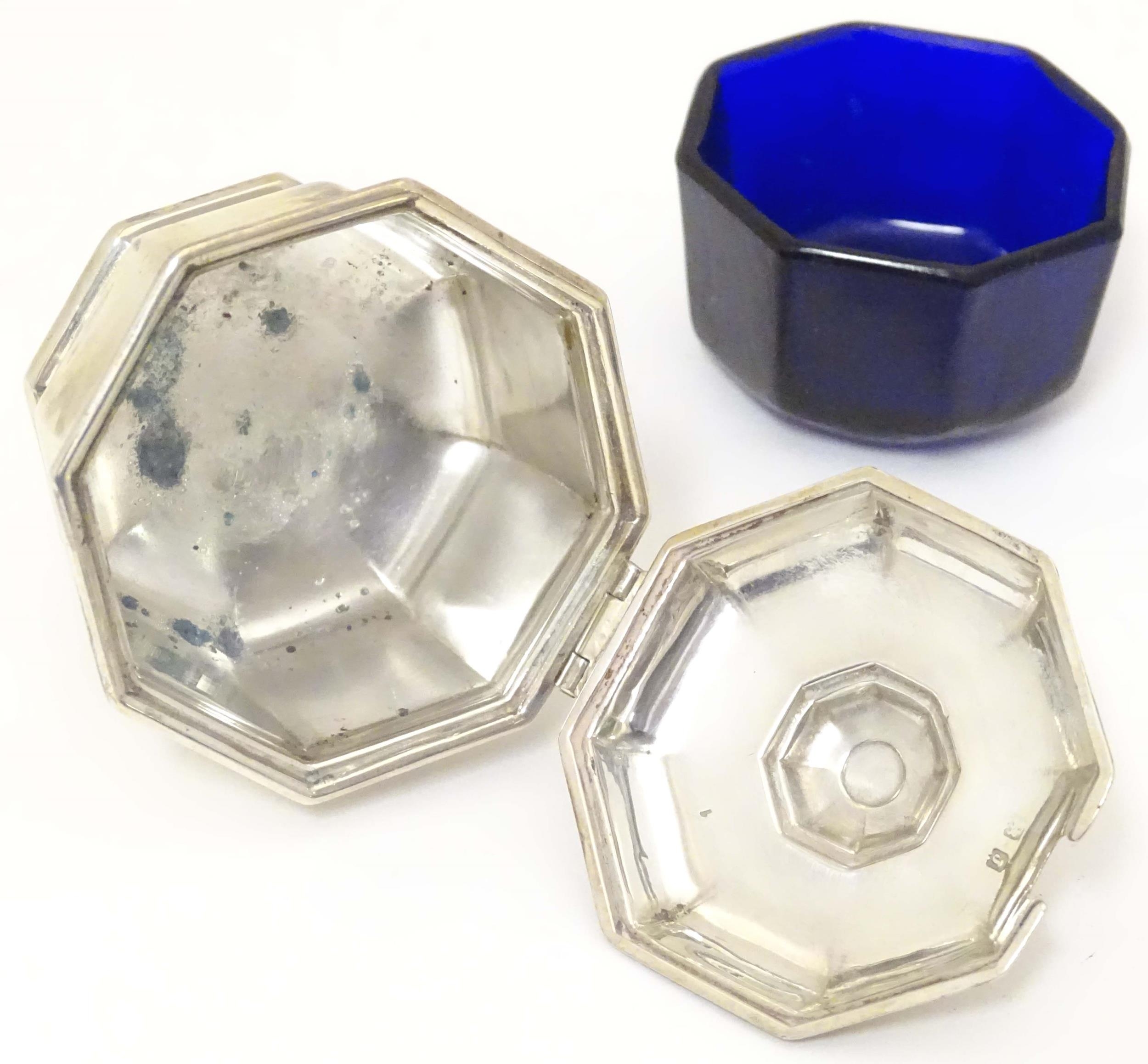 A silver mustard pot of octagonal form with blue glass liner. Hallmarked Birmingham 1933, maker - Image 2 of 7