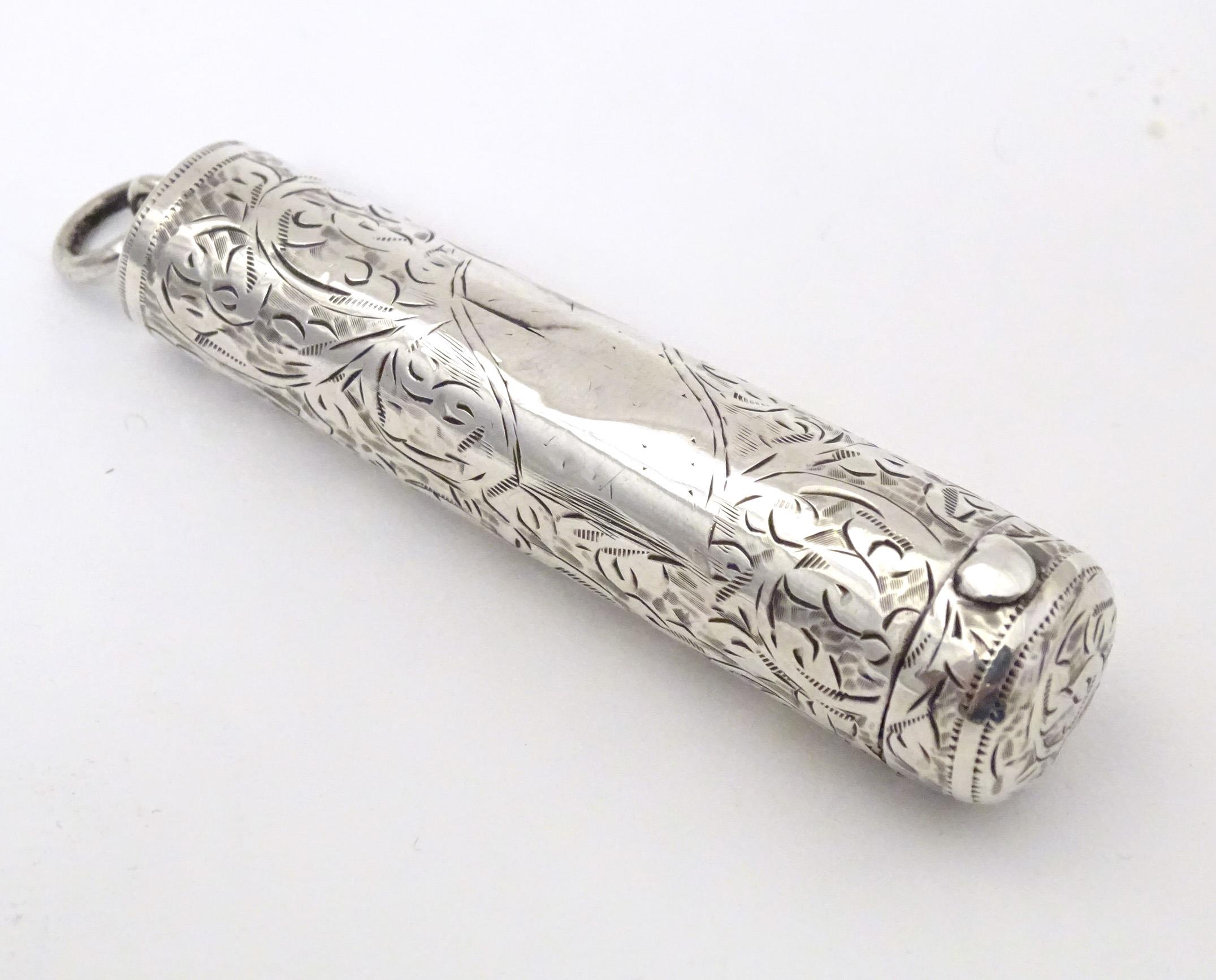 A silver cheroot mouthpiece case with engraved decoration, hallmarked Birmingham 1904, maker M.