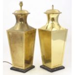 A pair of late 20thC German table lamp bases, of tapering form, constructed from brass and