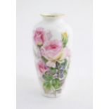 A Japanese Noritake vase with hand painted decoration depicting roses, signed. Marked under. Approx.