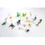 A quantity of assorted glass animals modelled as horses, fish, birds, cat etc (approx. 15) Please