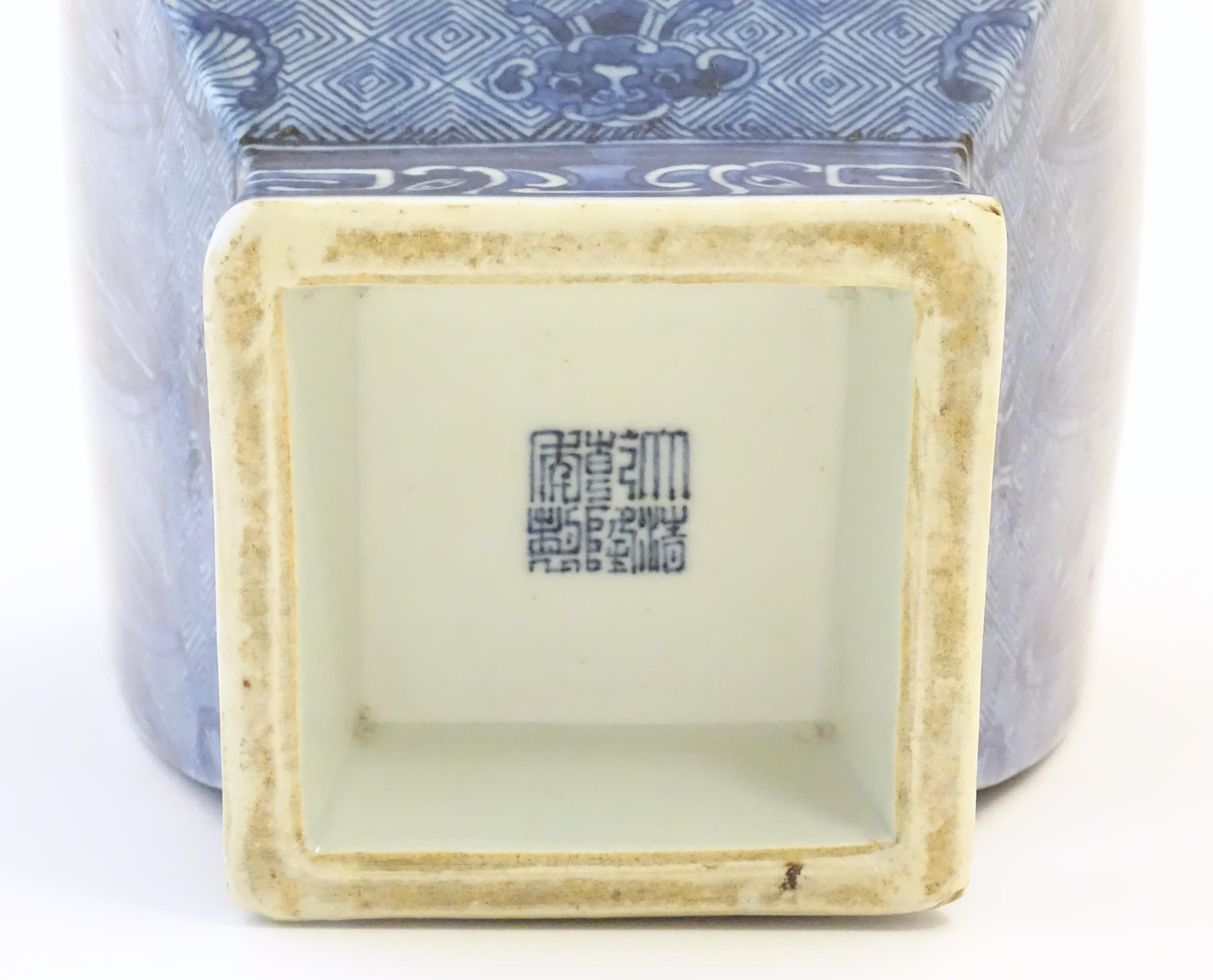 A Chinese blue and white vase of squared form decorated with stylised masks, banded detail and - Image 7 of 7