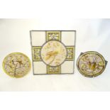 Three early 20thC stained and painted glass panels comprising two circular panels depicting