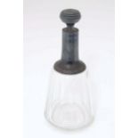 A French facet cut glass liquor decanter / flask with silver mounts. Approx. 7 1/2" high Please Note