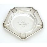 An Art Deco silver ashtray engraved to centre The Grange Park (Builders Ltd.) hallmarked London