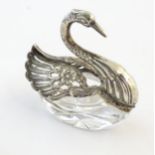 A cut glass salt with silver mounts modelled as a swan. Approx. 2 3/4" high Please Note - we do