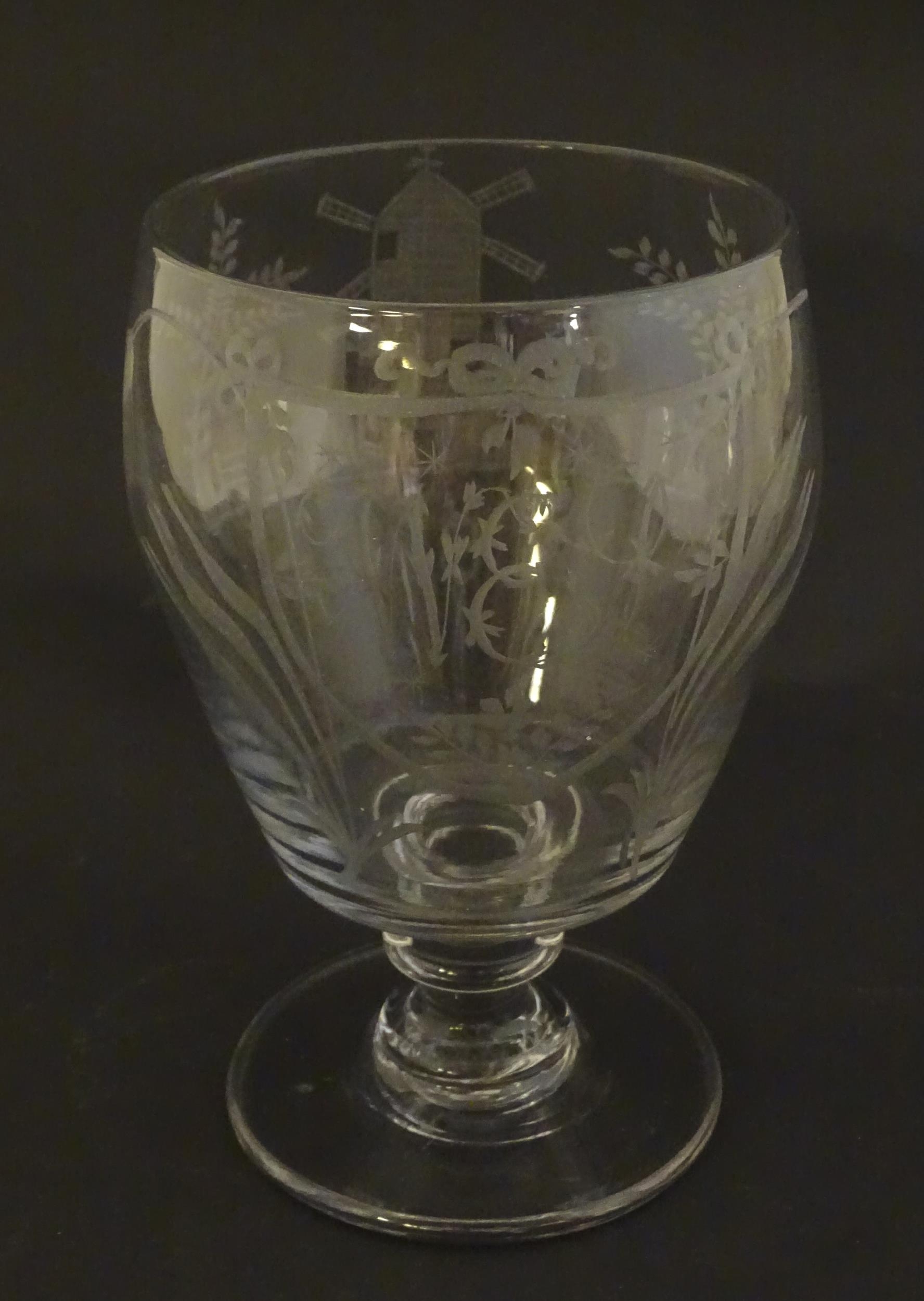 A 19thC glass rummer with engraved decoration depicting windmill and barley detail, with monogram
