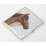 A Continental .900 silver cigarette case with horse head enamel detail. marked 900 and Indistinct