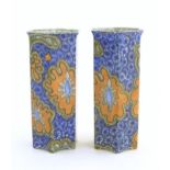 A pair of Art Deco Bursley Ware hexagonal vases in the pattern Benares. Marked under. Approx. 8 1/2"