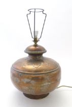 A 20thC copper table lamp of bulbous form with foliate detail approx. 16 1/2" high Please Note -