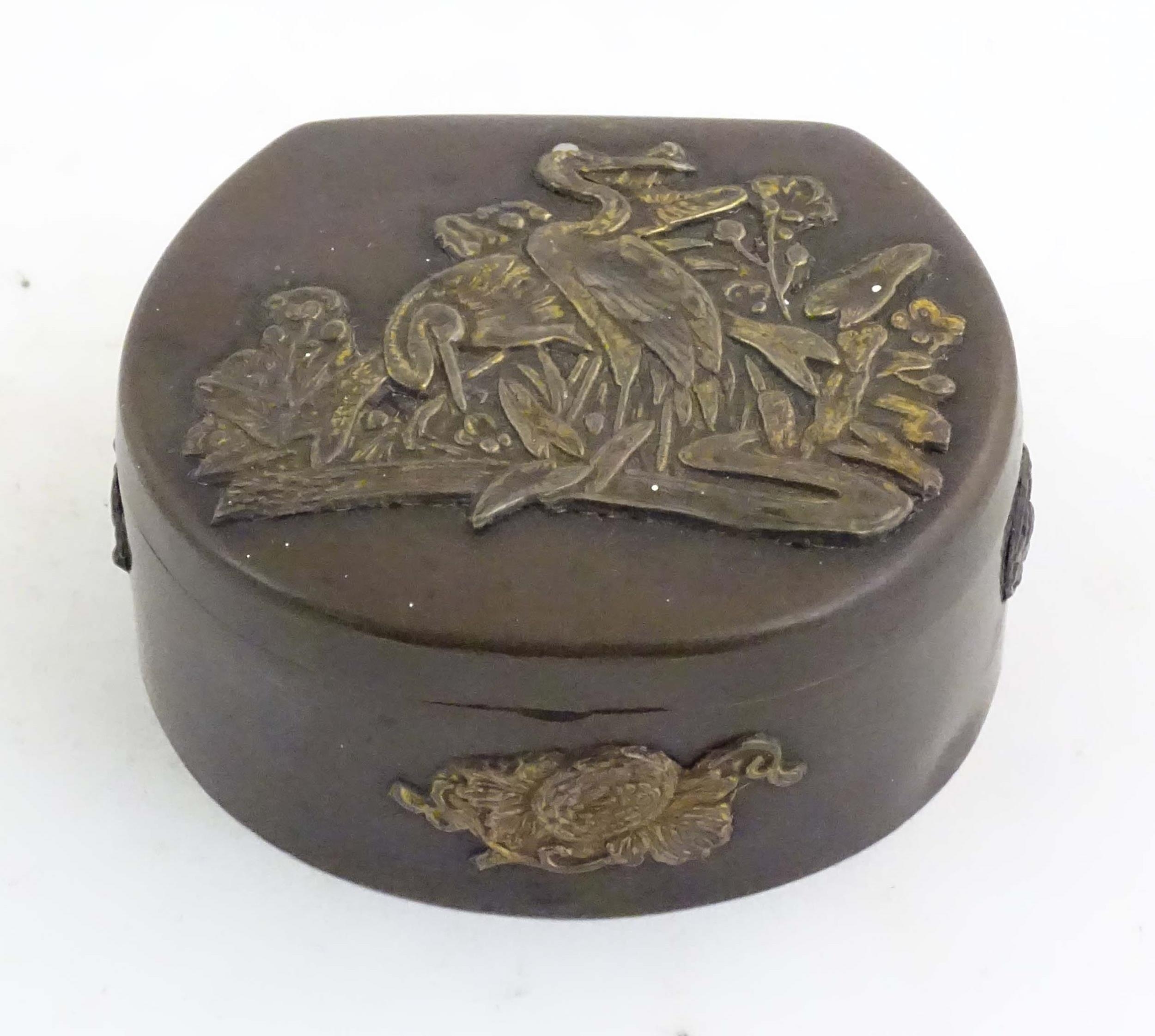 A Japanese lacquered brass stud box with a hinged lid, decorated with applied crane bird and - Image 3 of 8