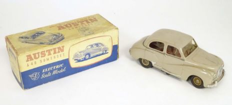 Toy: A boxed Austin A40 Somerset electric scale model car by Victory Industries of Guildford.