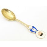 Scandinavian silver: A Danish silver gilt and enamel childs spoon with Inuit decoration by A