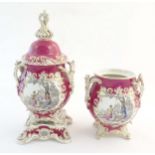 A Continental twin handled lidded vase on stand with relief scrolling decoration with vignettes