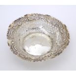 A Victorian silver bon bon dish of circular form with embossed and pierced decoration, hallmarked