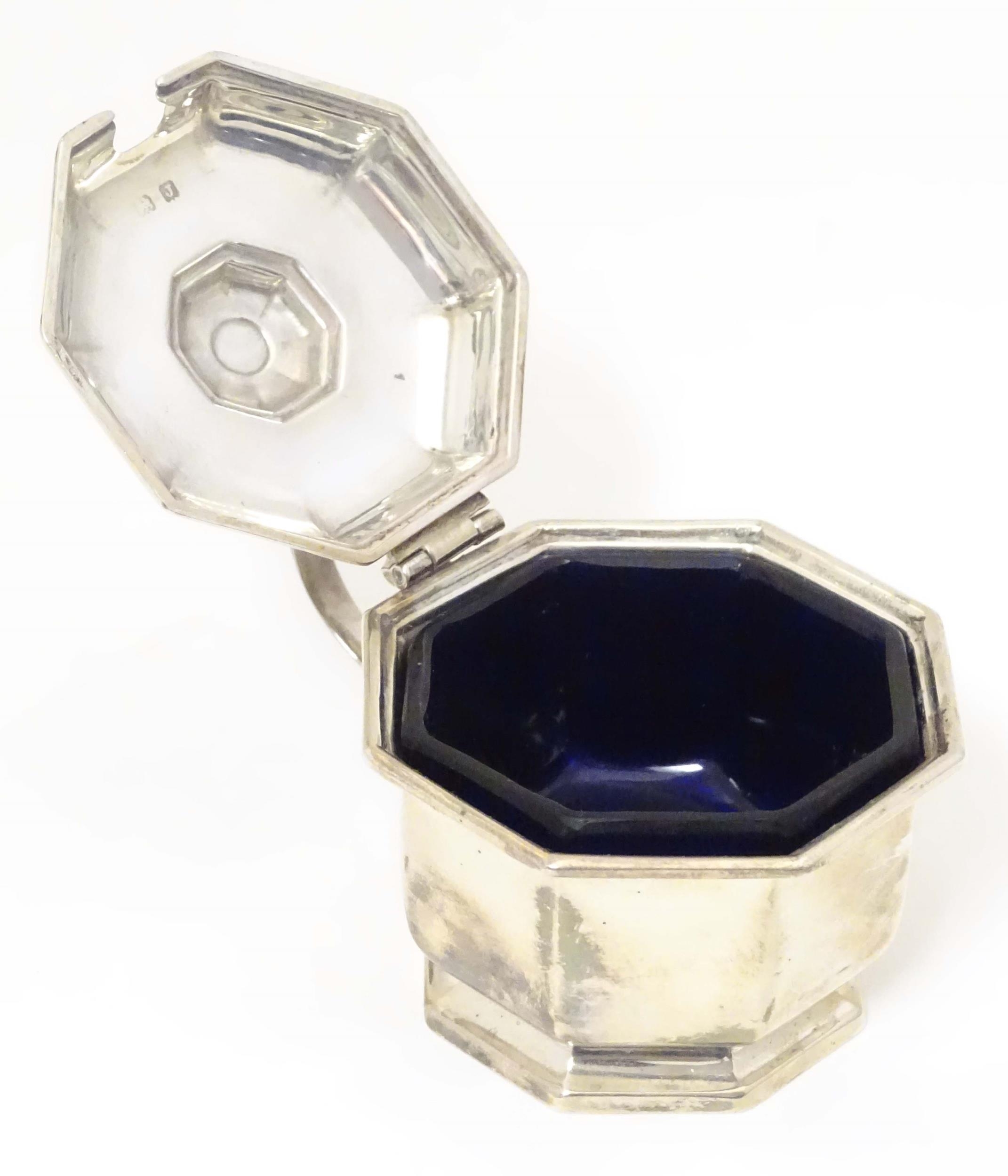 A silver mustard pot of octagonal form with blue glass liner. Hallmarked Birmingham 1933, maker - Image 6 of 7