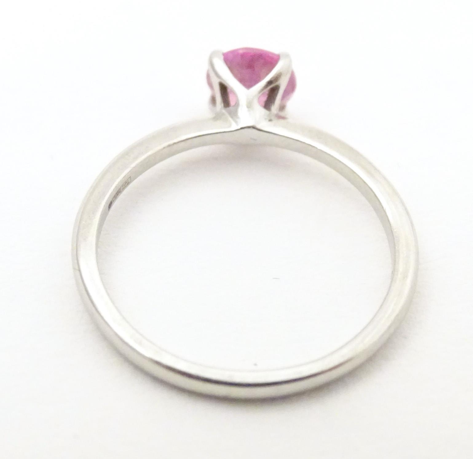 A platinum ring set with pink sapphire solitaire. Ring size approx. O Please Note - we do not make - Image 6 of 7