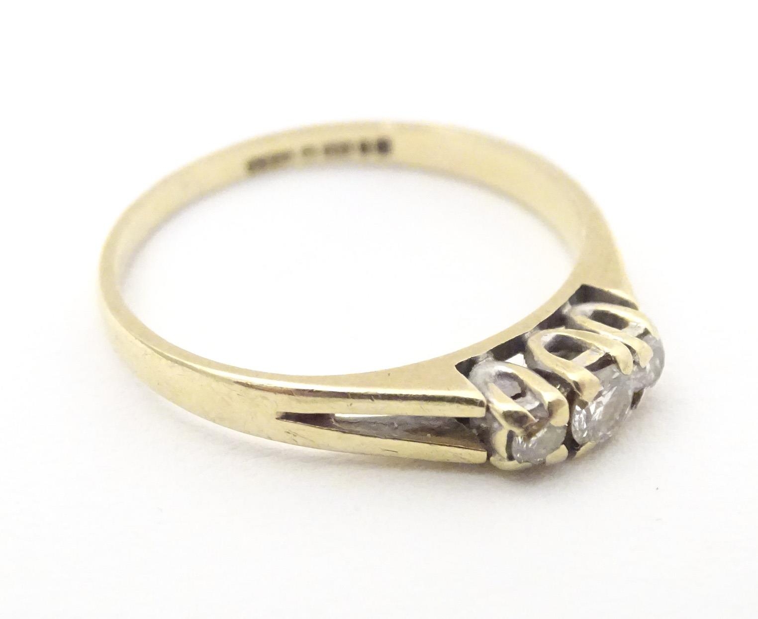 A 9ct gold ring set with trio of diamonds. Ring size approx N. Please Note - we do not make - Image 5 of 6