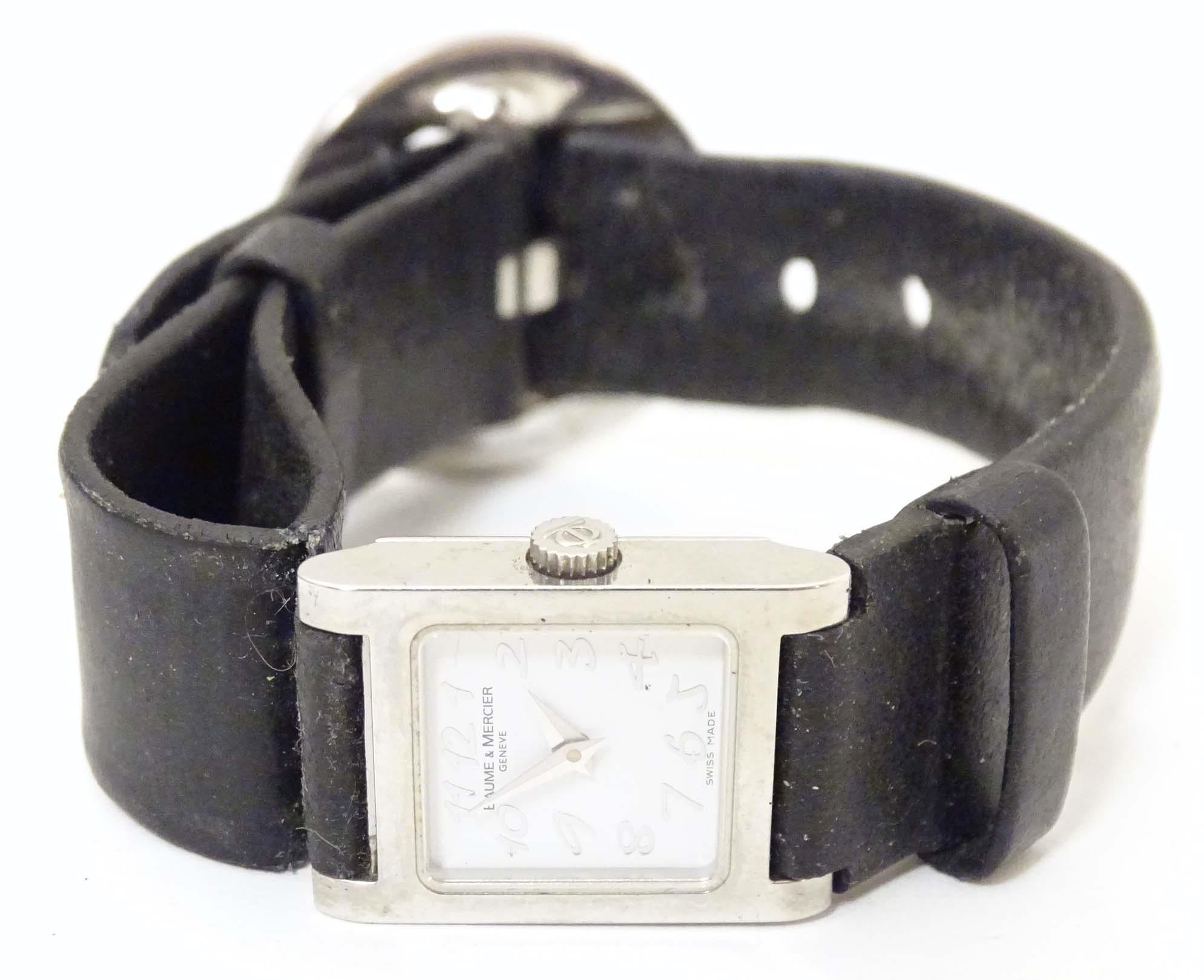 A Baume & Mercier Vice Versa quartz wrist watch, the case signed and numbered having a black leather - Image 9 of 12