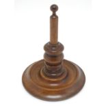 A 19thC treen / turned wooden yarn stand with a circular base. Approx. 7 1/4" high. Please Note - we