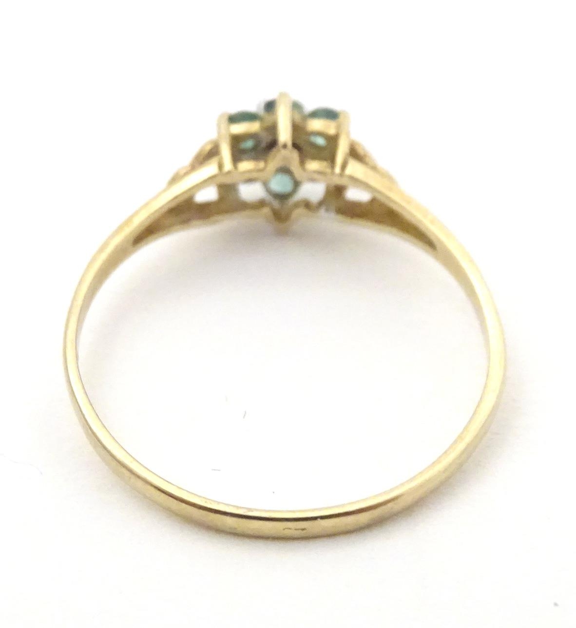 A 9ct gold ring set with central diamond bordered by emeralds. Ring size approx. S 1/2 Please Note - - Image 5 of 6