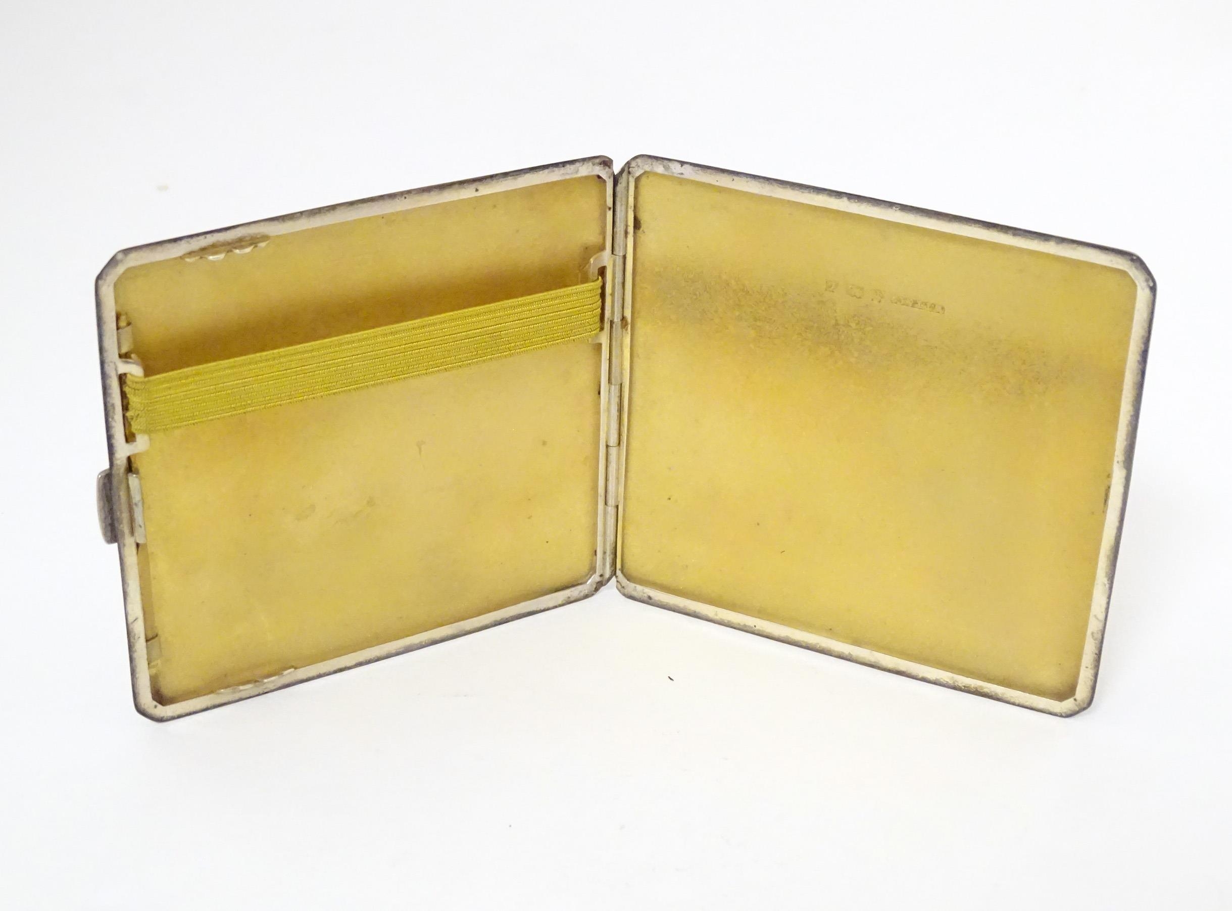 A silver cigarette case with engine turned decoration and gilded interior, hallmarked Birmingham - Image 8 of 10