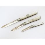 Three various silver folding fruit knives with mother of pearl handles hallmarked Sheffield 1911,