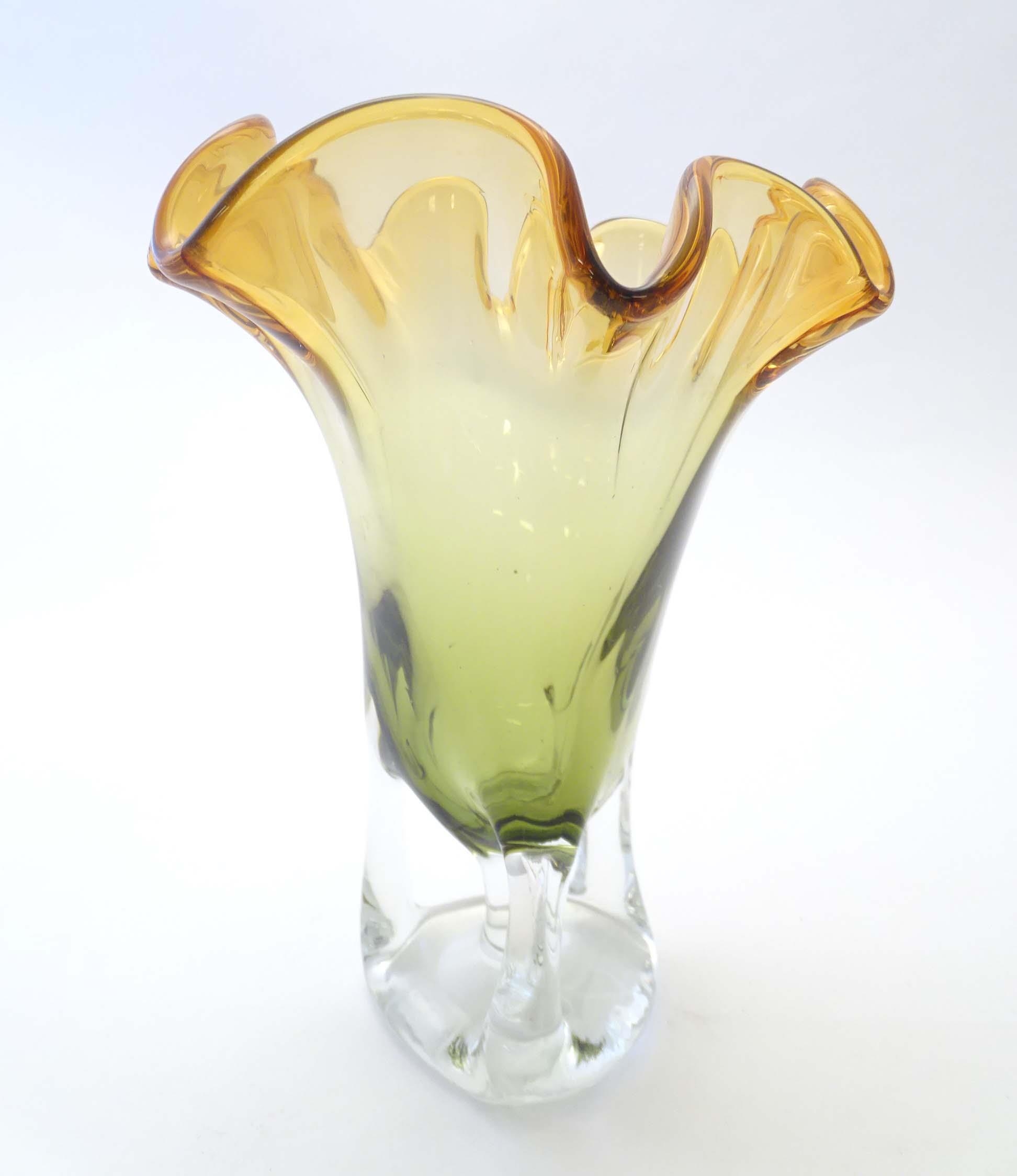 A studio glass vase with amber flared rim and body on a open clear glass base. Approx 11" high - Image 6 of 7