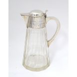 An Art Deco facet cut glass claret / water jug with silver mount and handle, hallmarked Birmingham