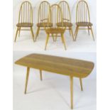 Vintage / Retro: A late 20thC Ercol dining table and five chairs, the elm topped table raised on