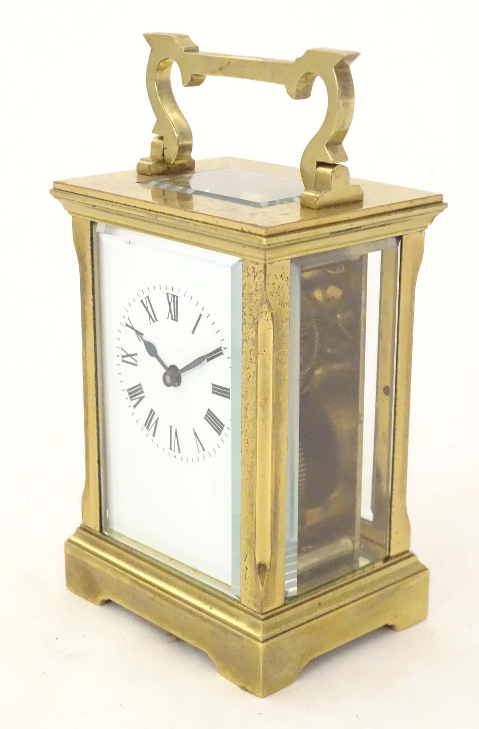 A brass carriage cock with white enamel dial enamelled dial set with Roman numerals, the backplate - Image 4 of 9