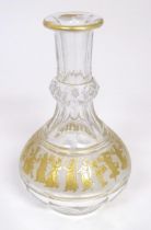 An early 20thC glass decanter with banded gilt detail depicting classical figures. Probably by