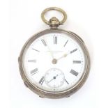 A Victorian silver cased pocket watch, hallmarked Birmingham 1890, the white enamel dial with