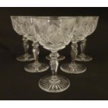 Six 20thC pedestal wine glasses with cut decoration. Approx. 6" high (6) Please Note - we do not