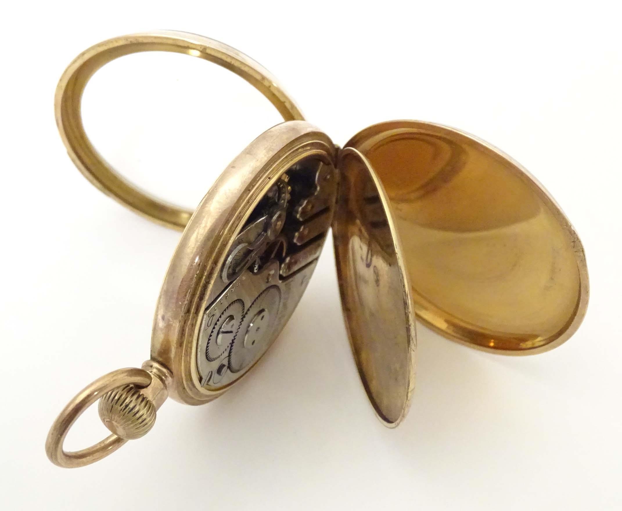 An Ingersol - Trenton 15 jewel pocket watch in a gilt metal case, the enamel dial signed Ingersol- - Image 6 of 11