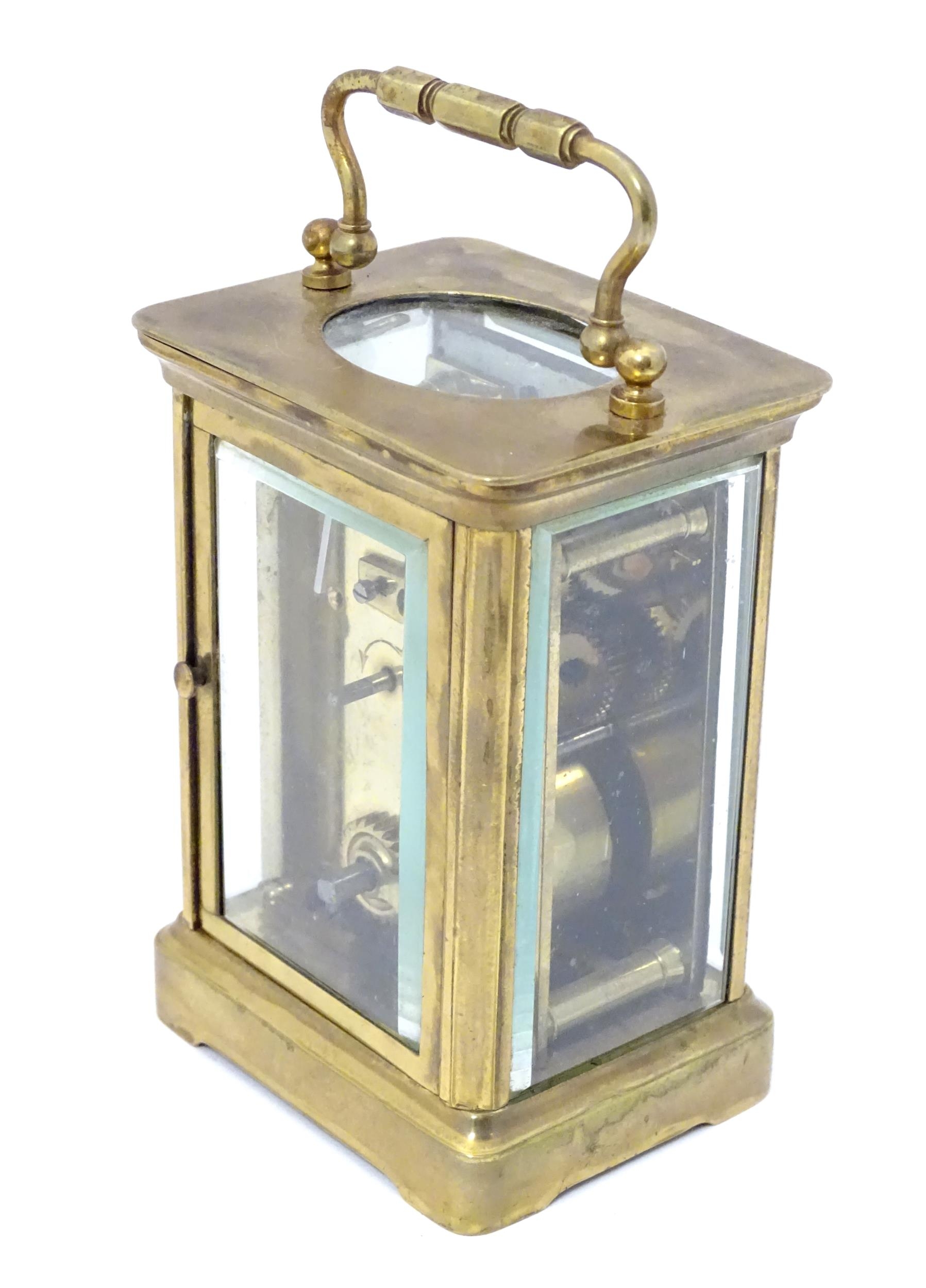 A carriage clock with brass case and enamel dial. Approx. 5 1/2" high overall. Please Note - we do - Image 6 of 13