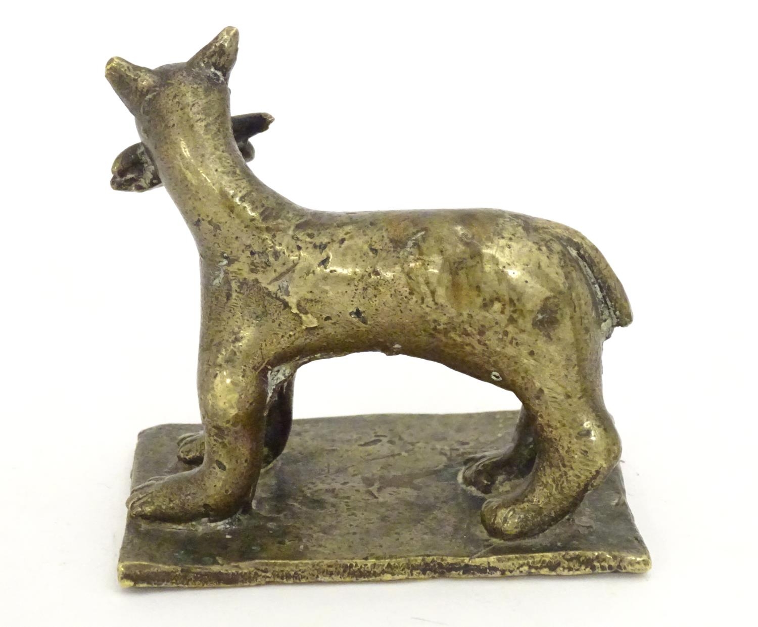 An 18th / 19th century naive bronze model of a standing cat with a fish, on a rectangular base. - Image 5 of 7