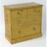 A 19thC pine chest of drawers with a moulded rectangular top above two short over two long graduated