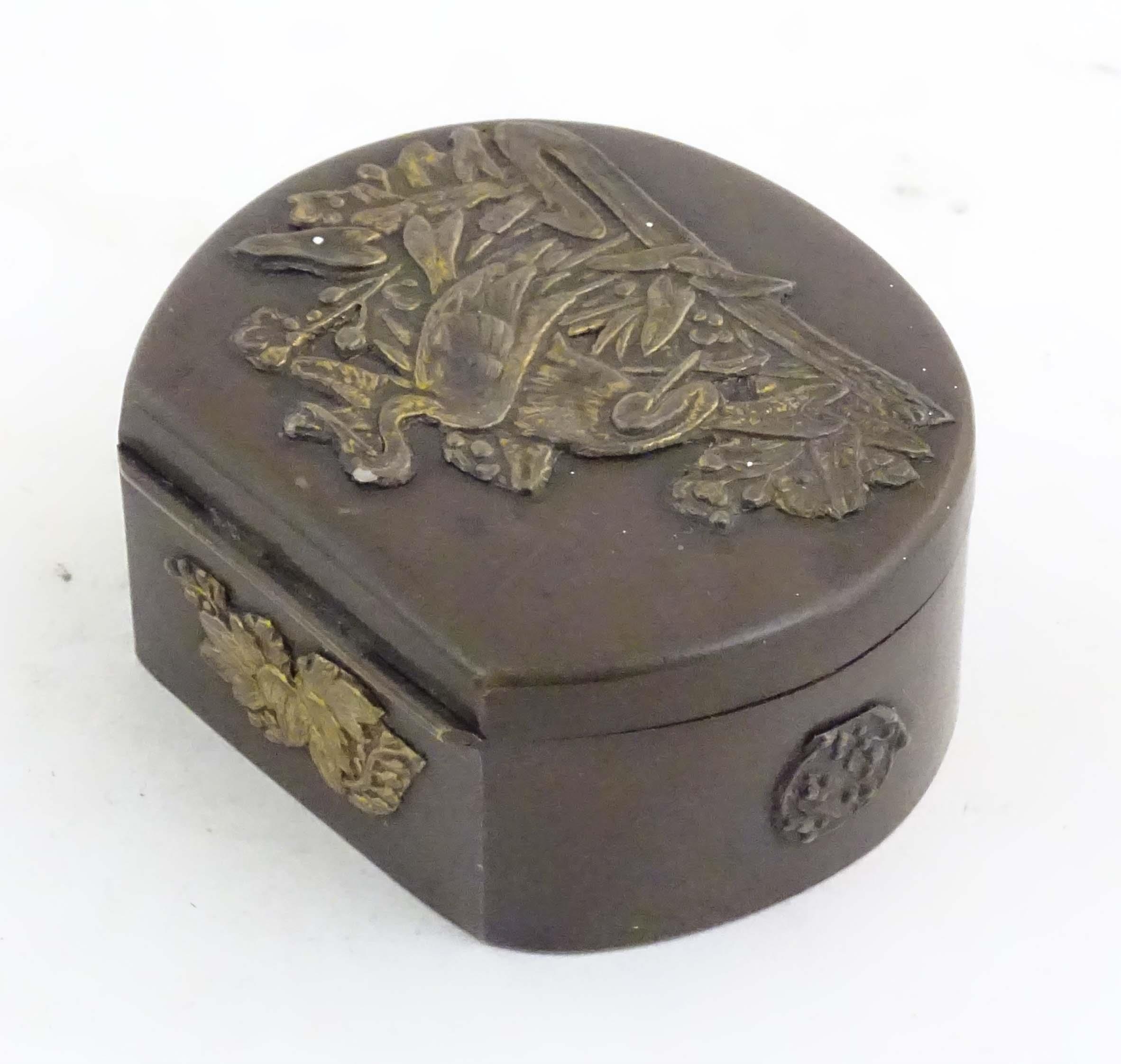 A Japanese lacquered brass stud box with a hinged lid, decorated with applied crane bird and - Image 6 of 8