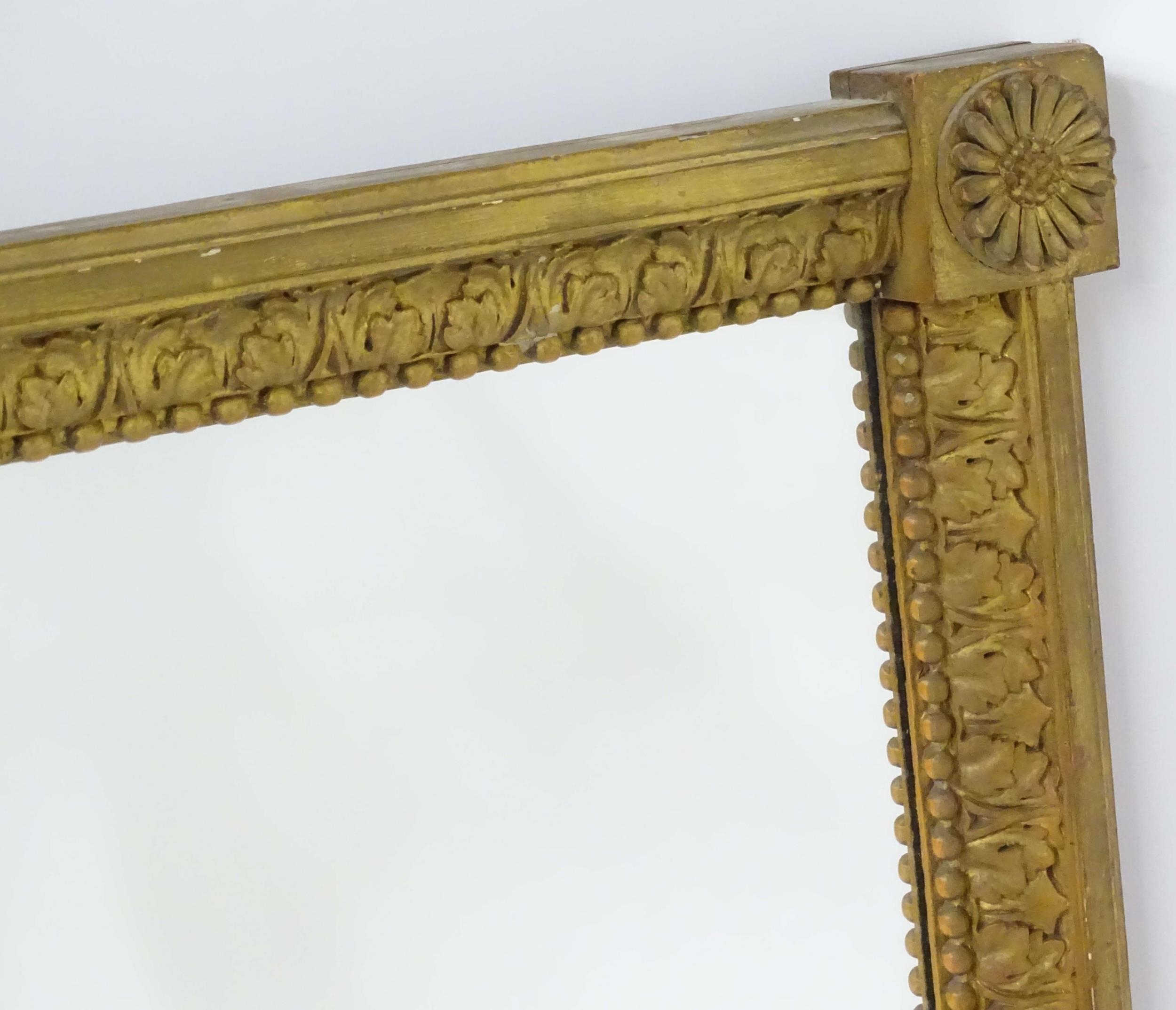 A late 18th / early 19thC mirror with a giltwood and gesso frame, having carved florets to the - Image 5 of 6