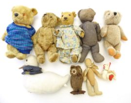 Toys: A quantity of late 19th / early 20thC teddy bears to include a straw filled bear, bears with