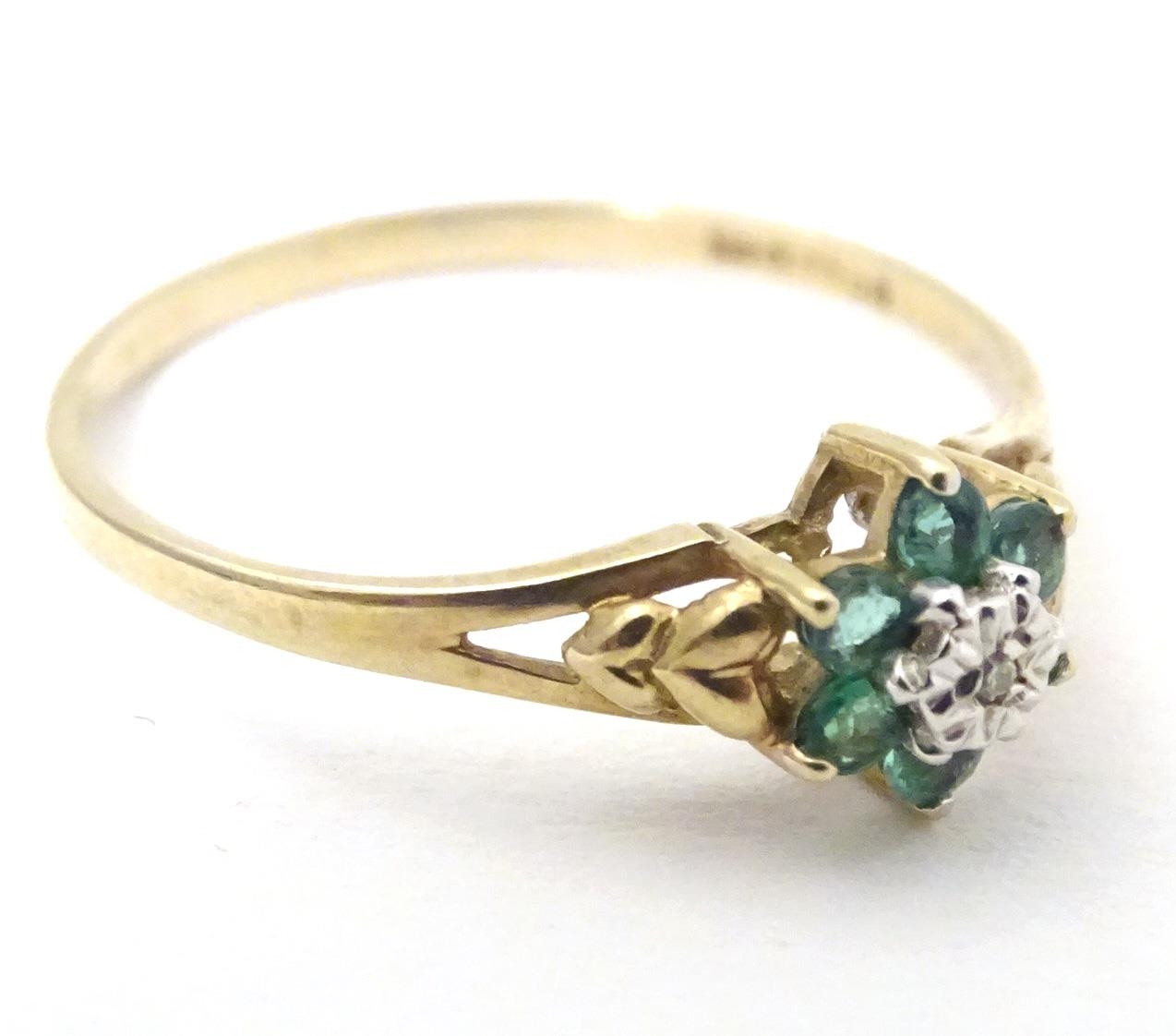 A 9ct gold ring set with central diamond bordered by emeralds. Ring size approx. S 1/2 Please Note - - Image 4 of 6