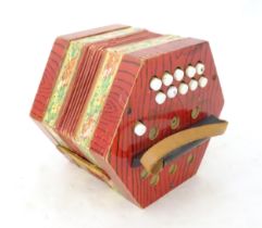 Musical Instrument: a mid 20thC Rosetti Rambler (Germany) concertina / accordion / squeezebox, of