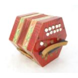 Musical Instrument: a mid 20thC Rosetti Rambler (Germany) concertina / accordion / squeezebox, of